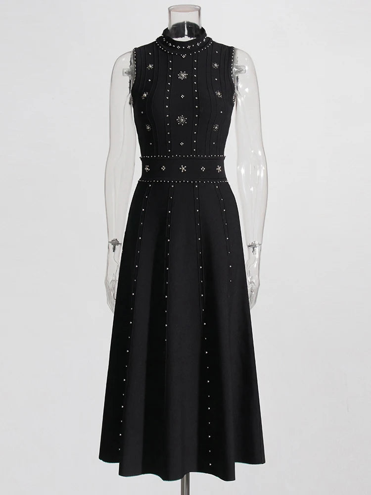 Zalia Atelier | Black O Neck Midi Dress with embroidered beads