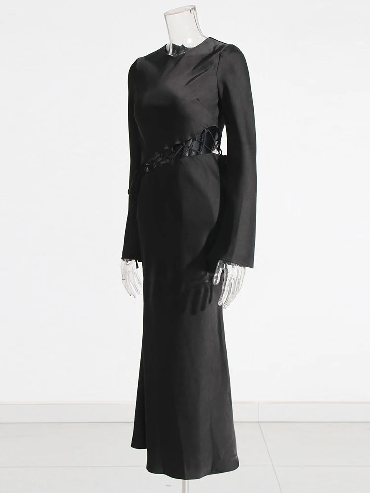 Zalia Atelier | Black long dress with long sleeves and waist cutout with lace up