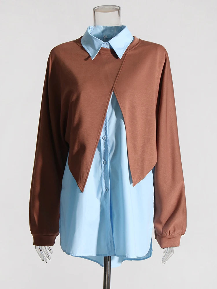 blue shirt with a layered brown knit