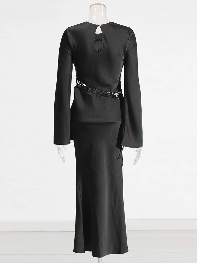 Zalia Atelier | Black long dress with long sleeves and waist cutout with lace up