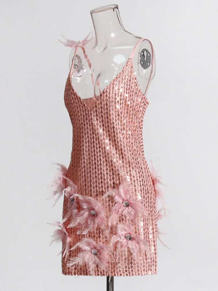 Pink sequins and feathers mini dress