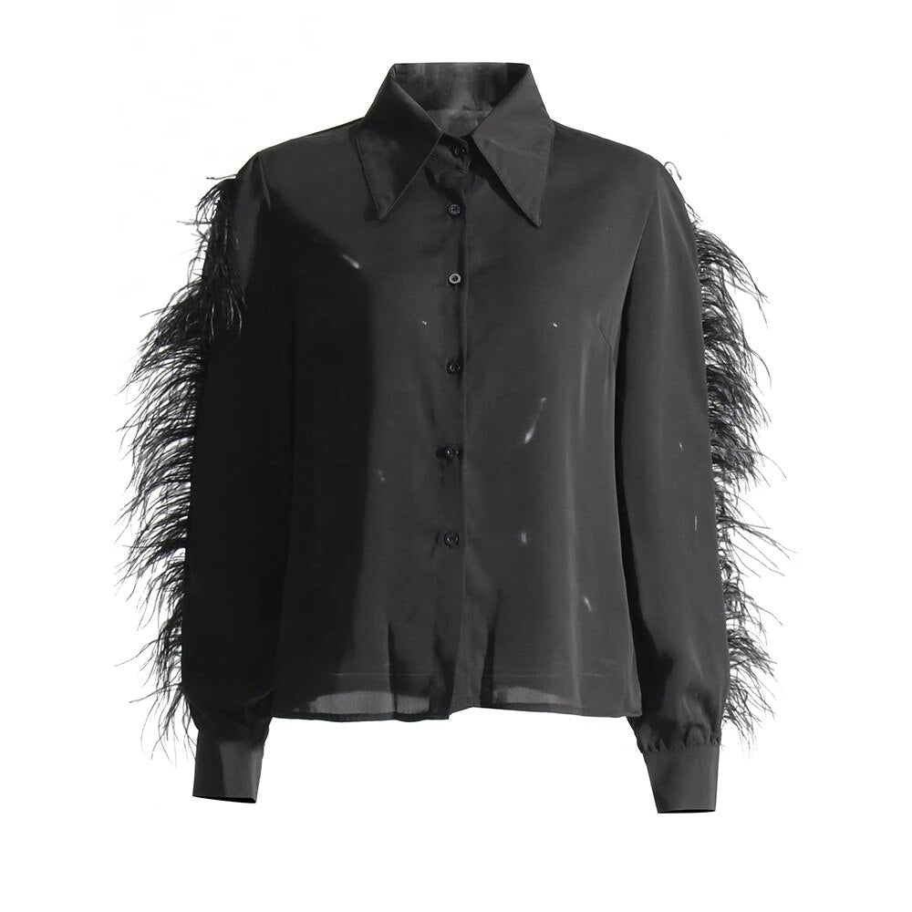 Black long sleeve blouse with feather trims