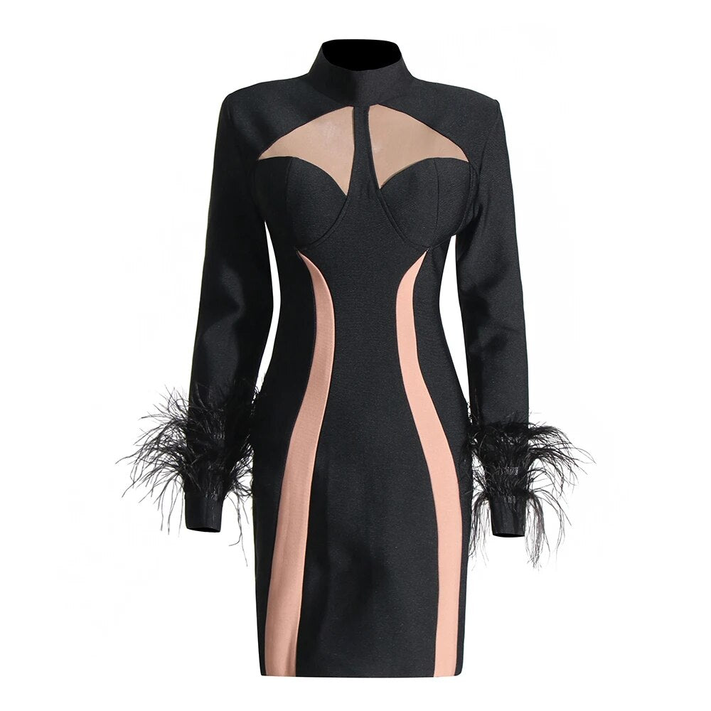 Black mini dress with mesh cutouts and feather trims in cuffs