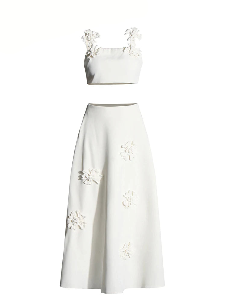 A two-piece outfit set featuring a square collar sleeveless top and a high-waisted A-line skirt, both in white with spliced applique details.