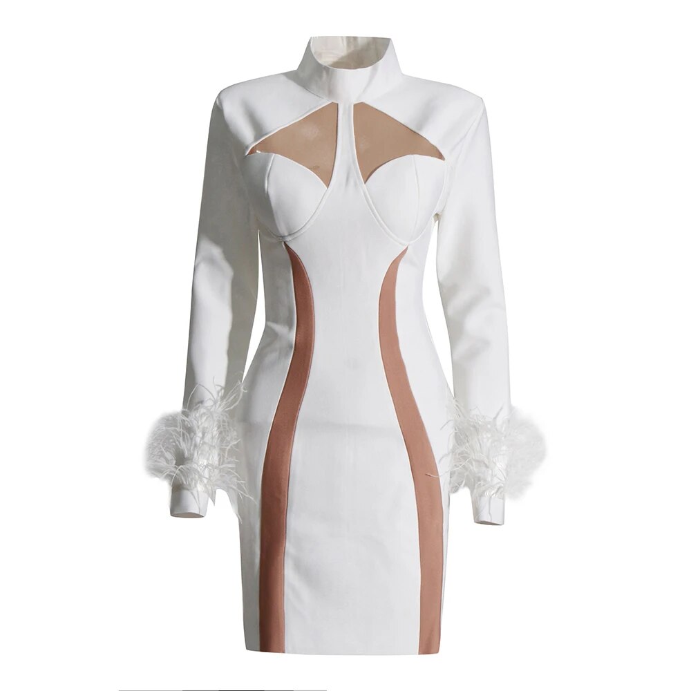 White mini dress with mesh cutouts and feather trims in cuffs