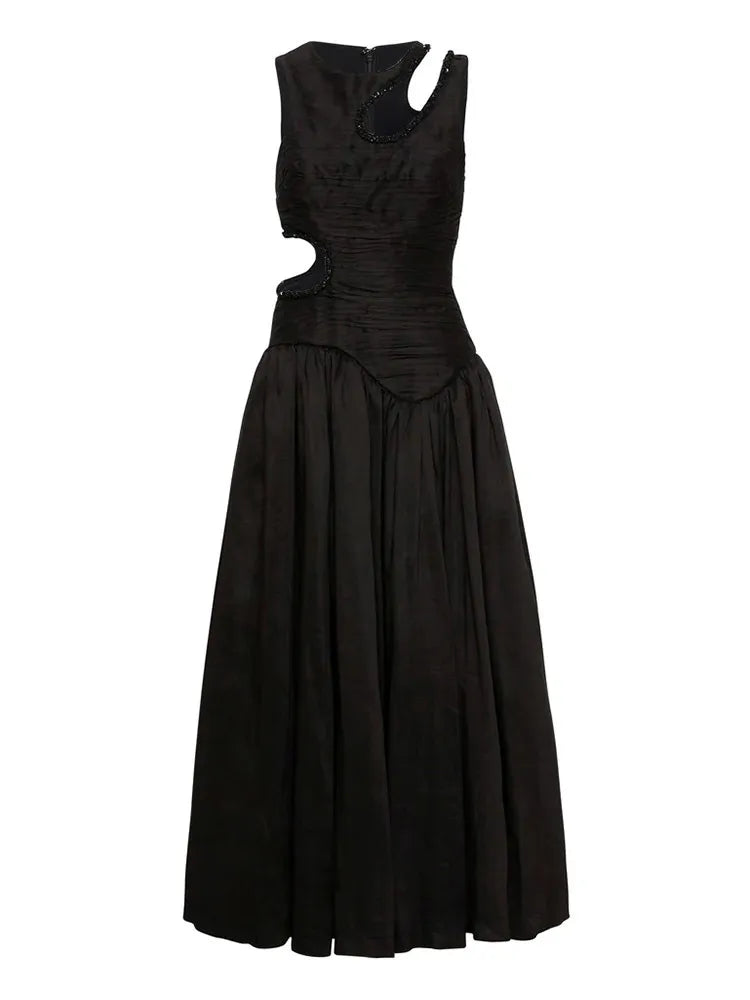 black midi dress with rhinestone trim cutouts