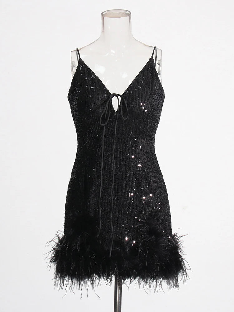 Black mini dress sequins and feather trims