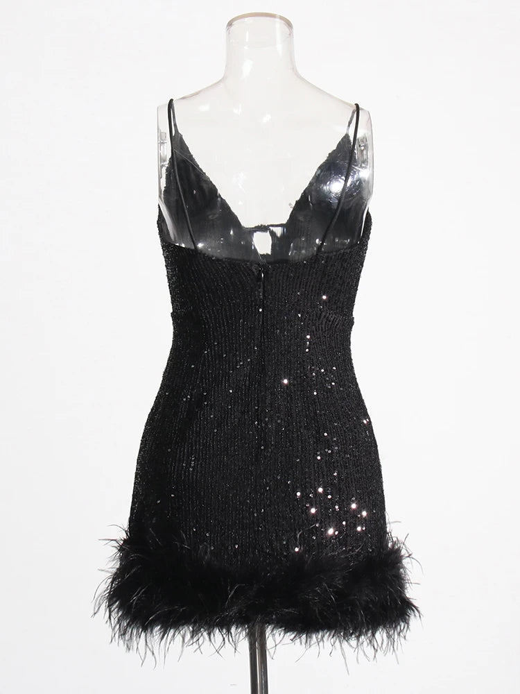 Black mini dress sequins and feather trims