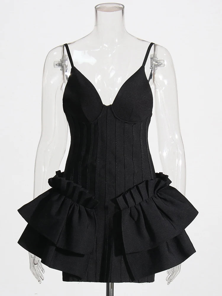 black mini dress spaghetti straps ruffled skirt detail