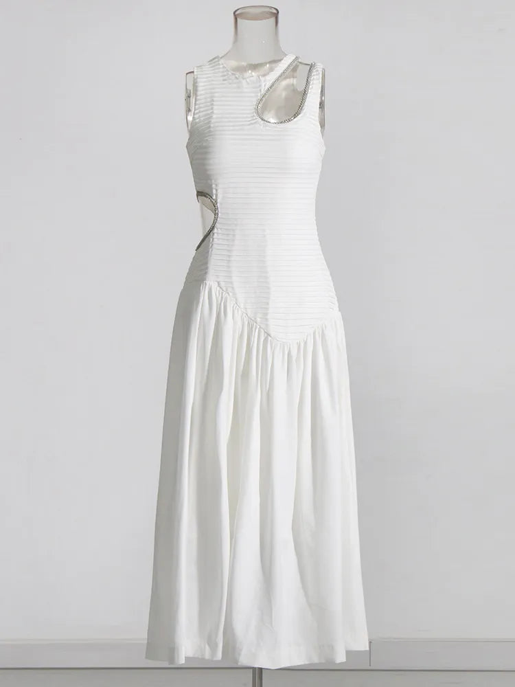 White midi dress with rhinestone trim cutouts