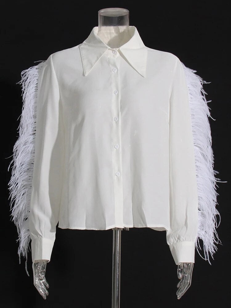 White long sleeve blouse with feather trims