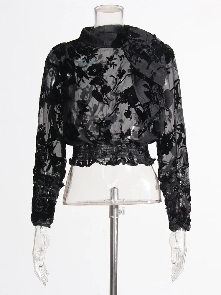 Black lace top with long sleeves and elastic waist