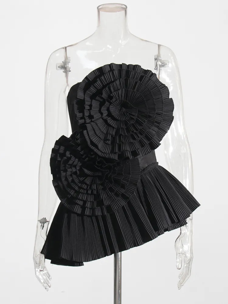 Black strapless top with ruffle appliques and asymmetrical hem