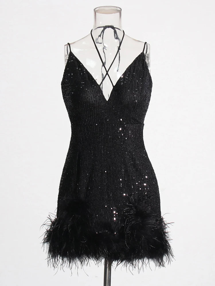 Black mini dress sequins and feather trims