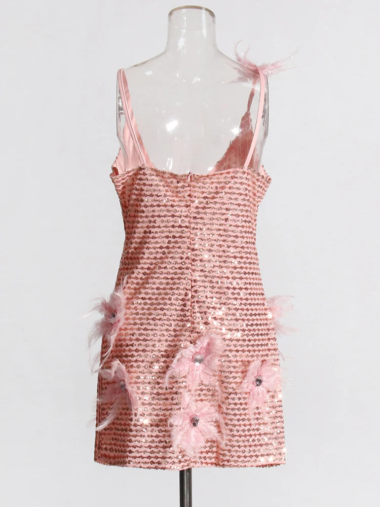 Pink sequins and feathers mini dress