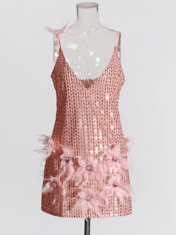 Pink sequins and feathers mini dress