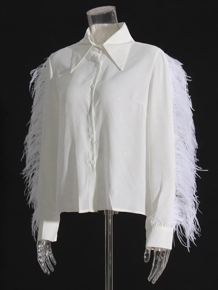 White long sleeve blouse with feather trims