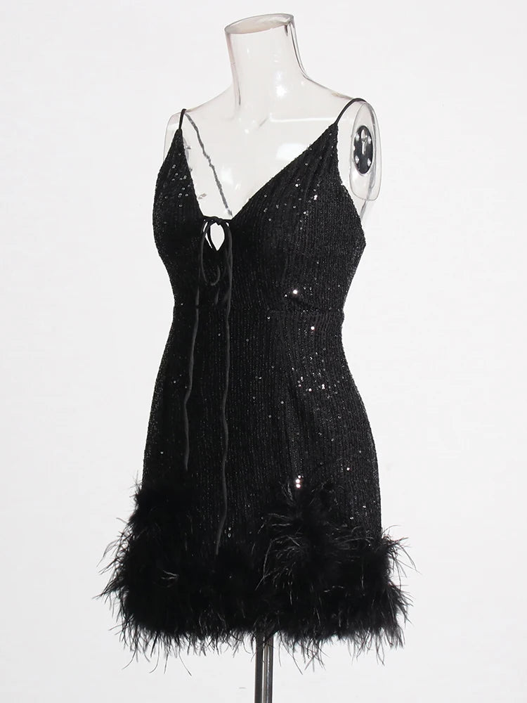 Black mini dress sequins and feather trims