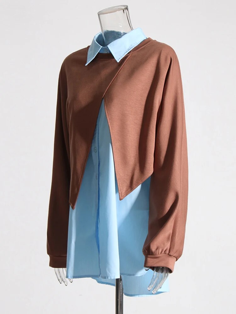 blue shirt with a layered brown knit