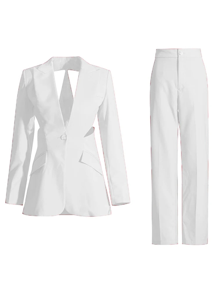 white cutout blazer and matching trousers set