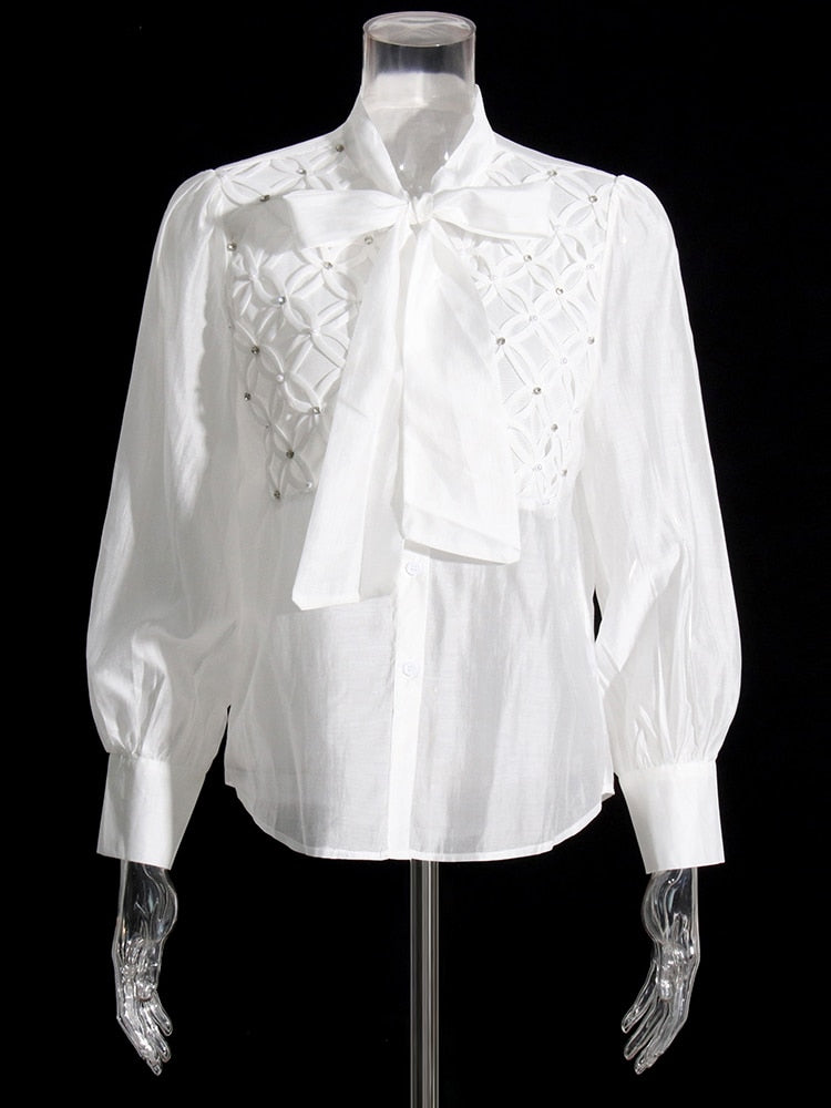 White women's shirt with bow knot collar and rhinestone detail